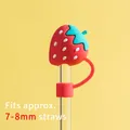Reusable red strawberry silicone straw cover cap for 7-8mm straws on yellow background - Red Strawberry (For 8mm Straws)
