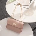 Chic nude pink leather crossbody bag with elegant gold chain strap and turn-lock closure - Flesh Pink