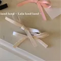 Set of sweet bow hair clips in cream and pink ribbon style for princess hairstyles - F-013 White 1pc