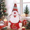 Christmas gnome plush doll featuring a red knit sweater with golden reindeer embroidery - Santa Claus with Gift Bag