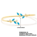 Gold leaf-shaped open bangle with turquoise stones and clear cubic zirconia accents - 16K Gold Blue Zirconia