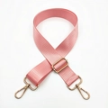 Detail of pink nylon bag strap featuring golden lobster clasps and adjustable buckle - Gold Buckle / Pink