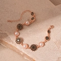 Detailed macro shot of vintage rose gold sunflower bracelet with pink pearls and crystals - Rose Gold With Rhinestone Pearl