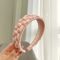 Close-up of the woven satin texture and intricate craftsmanship on the pink headband - Pink