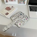 Close-up of a silver wavy handheld mirror with colorful gemstones and metallic finish - Large Square