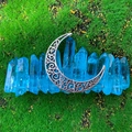 Detail of bohemian blue crystal moon crown featuring raw quartz and carved crescent moon - Light Blue Crystal With Moon