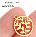 Golden stainless steel circular leaf pendant in 15x17mm size shown on fingertips - DY947 / Gold