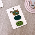 Detailed set of three floral and polka dot fabric BB hair clips on a branded display card - Green Set