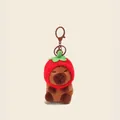 Cute capybara plush keychain wearing a red tomato hat with a brown metal clasp - Strawberry Headwear
