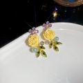 Detail of vintage floral earrings with yellow roses, green leaves, and pearls on a white plate - Yellow Rose Earrings (925 Sterling Silver Earring Post)