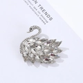 Elegant silver swan brooch with sparkling crystals on a decorative display card - White Swan
