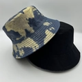 Close-up of blue gold tie-dye and black cotton bucket hats with multi-stitch brim detail - Blue-Gold Tie-dye 2-Piece Set (20)
