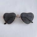 Pink heart-shaped sunglasses with a gold metal frame and dark gray tinted lenses - Grey Lens