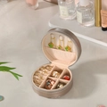 Portable champagne round jewelry box with faux leather finish and velvet lining for rings - Champagne Silver