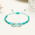 Handgefertigtes gewebtes Armband mit blauen Aquamarin-Perlen und rohen Kristallen - Cyanblau