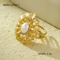 Detailed macro view of vintage gold ring with shell texture and a centered faux pearl inlay - Gold Large Flower Pearl(NMSH-A744-1)