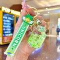 Luminous unicorn keychain with green liquid sand charm and silicone strap for bag decoration - Green Luminous Bubble Bead Gas Tank