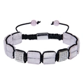 Macro view of woven bracelet with pink square natural stone and silver micro-pave charms - Rose Quartz Bracelet