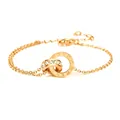 Close-up of interlocking Roman numeral rings and crystal pavé on 18K rose gold chain - Roman Double Ring Bracelet / Gold