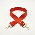 Detail of adjustable orange nylon replacement strap with golden metal swivel hooks - Orange