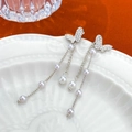 Elegant silver butterfly tassel earrings with white pearls and sparkling rhinestones - Butterfly Body Rhinestone Tassel Style (M-093)