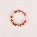 Detail view of ten rotatable rose gold beads on an anti-anxiety stainless steel ring - Rose Gold (Stainless Steel)