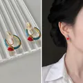 French vintage C-shaped blue enamel ear clips with a red heart pearl accent - Blue Red Heart Enamel Clip-on