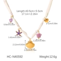 Detailed view of scarf necklace with shell, starfish and heart charms on silk ribbon - Shell Starfish Pendant Style (HC-N40592)