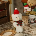 Adorable white plush bear in red knitted hat and striped scarf for Christmas decoration - White Bear