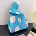 Blue knitted tote bag with white and purple dragon fruit pattern and single handle - Purple Strawberry - Blue