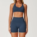 Set da yoga blu scuro con reggiseno sportivo all'americana e pantaloncini a vita alta - Taglia S / Top E Pantaloni / Reggiseno + Pantaloncini / Blu Navy