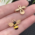 Golden enamel bee charm with black and yellow stripes for DIY jewelry making - Bee