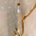 Golden crystal suncatcher with faceted clear balls reflecting rainbow light spots - B18 Style
