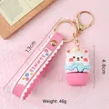 Schattige roze cartoon beer cupcake sleutelhanger met siliconen polsbandje en goud - Cartoon Zacht PVC IJs Beer / Roze