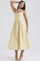 Detail of light yellow floral sundress featuring thin straps and slim waistline design - S / Yellow Floral