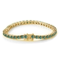 Macro view of gold tennis bracelet featuring green round stones and secure safety clasp - 15CM / Gold Blue-Green