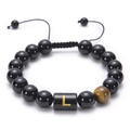 Close-up of adjustable braided bracelet with obsidian beads, tiger eye and gold letter L - Letter L
