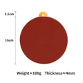 Red 16cm round silicone heat resistant mat with yellow handle for home kitchen usage - 16cm Heat Mat Retro Red