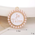 Macro shot of 3.2cm pearl shoe charm with white enamel and Je T'aime engraving - C470 Letter Pearl Ring