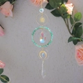 Rainbow sun catcher with green stones, golden moon sun motifs and crystal prisms - Aventurine Jade