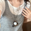 Close-up of bohemian starfish necklace with brown bear pendant and small mirror inlay - 100# Brown Geometric Mirror