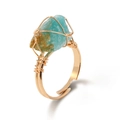 Handmade gold wire-wrapped ring with irregular raw turquoise stone and adjustable band - Amazonite