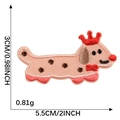Pink sausage dog embroidery patch with red crown and size measurements for DIY crafts - Pink Dachshund with Crown and Bow
