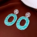 Macro detail of vintage floral resin earrings with hammered silver studs and wavy teal texture - 13# Silver Earring Post - Silver - Blue - Irregular Texture Hoop