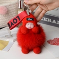 Detail of red sleeping baby doll keychain with plush fox fur ball and LOVE ribbon strap - Red