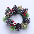 Christmas candle ring with pine cones, red berries and green needles on a white background - Christmas Candle Holder No.2