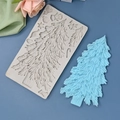 Silikonform in Weihnachtsbaum-Optik zum Backen mit Stern- und Schneeflocken-Motiven - Weihnachtsbaum-Kombination