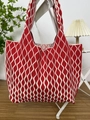 Detail of red and white wave pattern knit tote bag showing soft texture and spacious design - Diamond Red