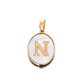 Detailed macro view of an oval stainless steel pendant featuring a gold letter N on pearl - Gold Letter N