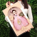 Fashion doll in pink lace dress inside a 41cm window gift box held by a person - 41cm Box Pink Wedding Dress 30cm Doll